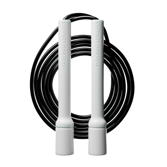 White jump rope with black cord on a white background